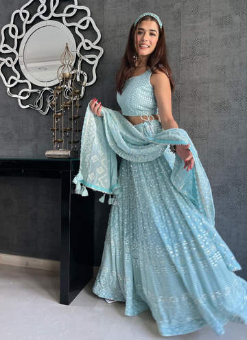 Impressive Sky Blue Foil Mirror Work Georgette Lehenga Choli